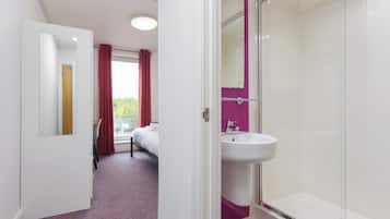 Shower, rainfall showerhead, towels, toilet paper