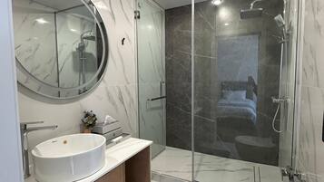 Panoramic Villa | Bathroom | Shower, hair dryer, slippers, towels