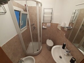 Hair dryer, towels, soap, toilet paper