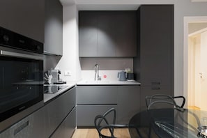 Apartment, 1 Queen Bed with Sofa bed, Balcony | Private kitchen | Fridge, oven, stovetop, espresso maker