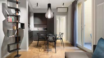 Apartamento, 1 cama Queen e sofá-cama, sacada | Área de estar