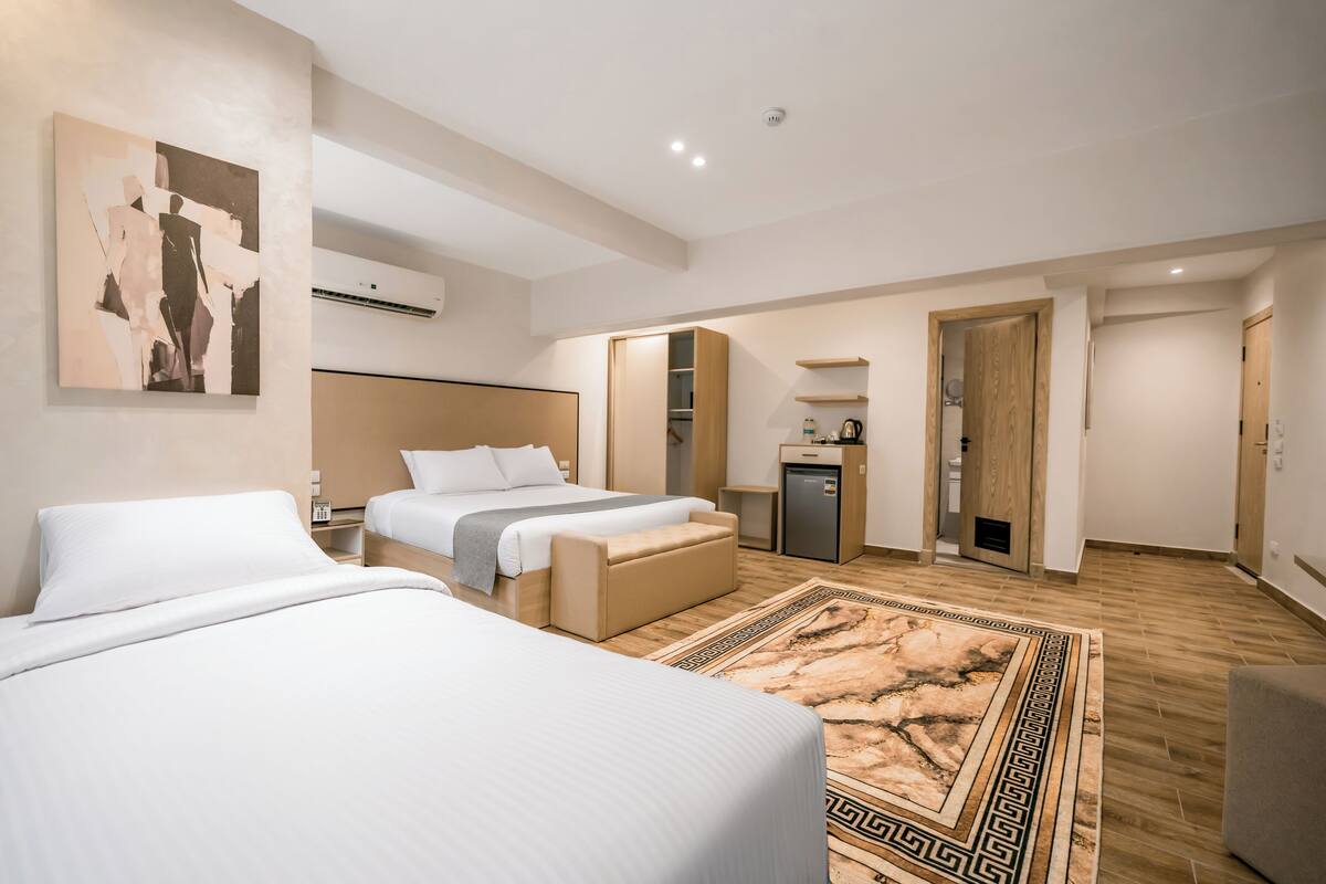 Family Room, City View | In-room safe, blackout drapes, iron/ironing board, free WiFi