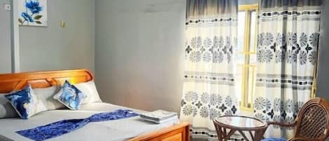 Chambre Triple, vue ville