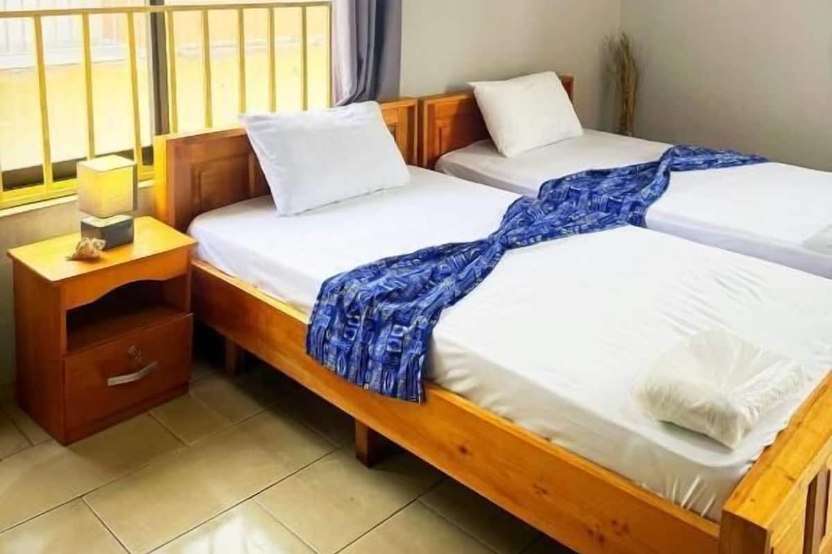 Habitación Deluxe con 2 camas individuales, balcón, vista a la ciudad | Wifi gratis