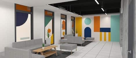 A modern interior with sofas, a coffee table, and a tiled floor.