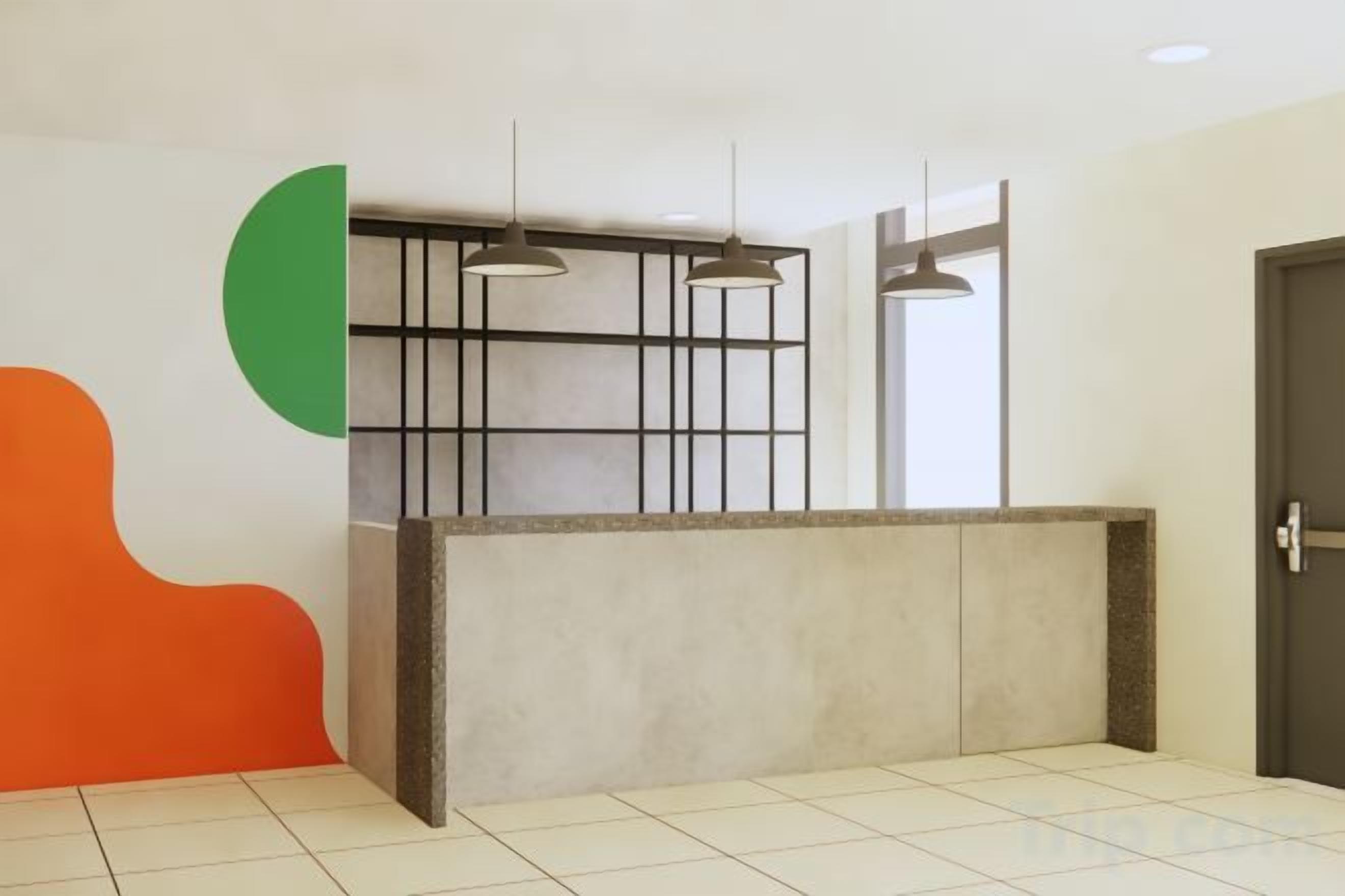 A reception area with a reception desk, hanging pendant lights, and a door to the right.