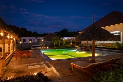 "Relaxing cozy bungalows Escape with Garden Views & Free WI-FI with speed