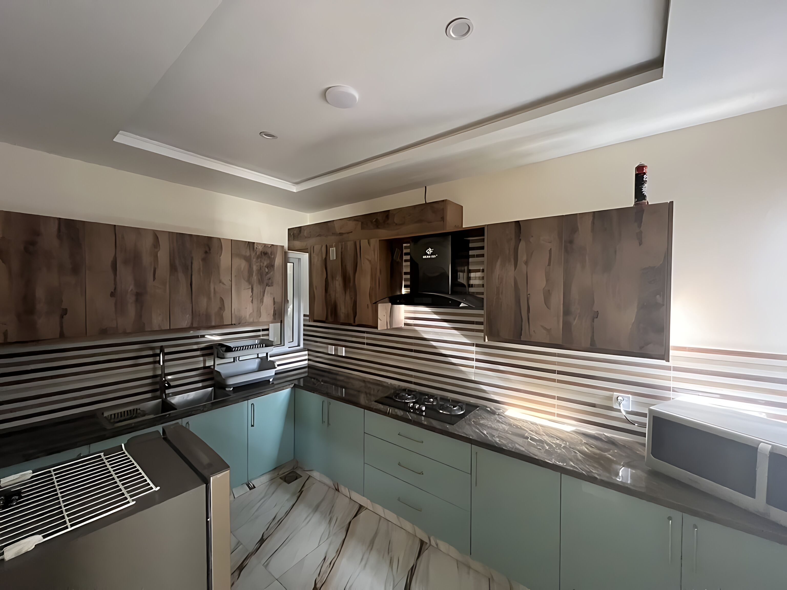 Mini-fridge, microwave, stovetop, cookware/dishes/utensils