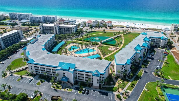A resort with multiple buildings, a central pool area, and a beach view. - Premier Gulf Views • Private Balcony • Freshly Updated | Amalfi 303A (Miramar Beach)