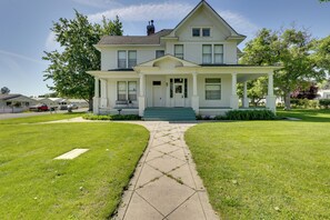 A two-story house with a front porch, a driveway, and a lawn. - 2 Mi to River: Historic Clarkston Home w/ Views! (Clarkston)