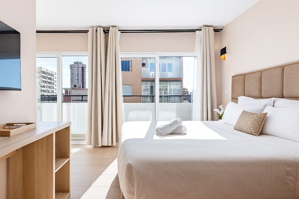 Studio, Balcony, City View | In-room safe, desk, blackout curtains, iron/ironing board