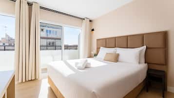 Studio, Balcony, City View | In-room safe, desk, blackout curtains, iron/ironing board