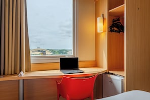 Standard Twin Room, City View | Minibar, desk, laptop workspace, blackout drapes