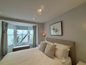 2 bedrooms, iron/ironing board, travel crib, internet