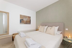 🛏️ CoastLight Rooftop by Bayside · Master bedroom with premium double bed, soft lighting and a serene design for restful nights. ✨