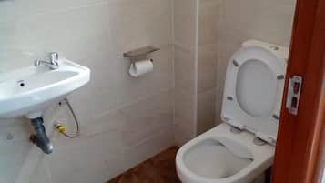 Deluxe Single Room, City View | Bathroom | Shower, slippers, towels, soap