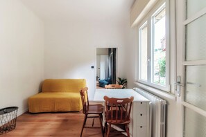 Appartement Confort, patio | Coin séjour