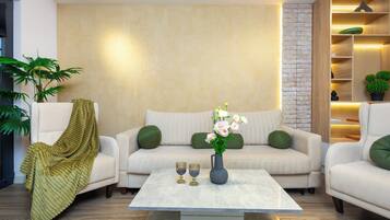 Classic Apartment, 2 Bedrooms | Living area | 50-inch flat-screen TV with cable channels