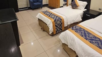 Suite Deluxe, 1 habitación | Minibar, wifi gratis y ropa de cama