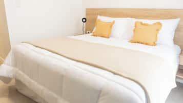 Desk, laptop workspace, free WiFi, bed sheets