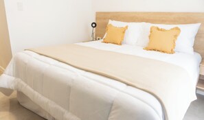 Desk, laptop workspace, free WiFi, bed sheets