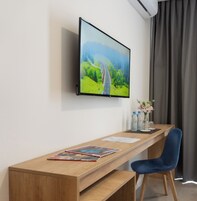 Desk, laptop workspace, free WiFi, bed sheets