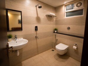 Shower, free toiletries, towels, soap - Santhi Comfort Hotel Near Manyta Tech Park (Bengaluru)