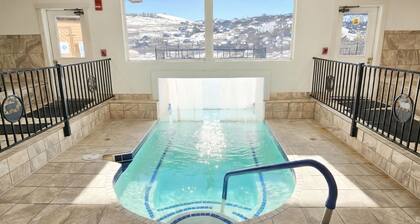 Cozy 2-bed, 2-bath mountain condo with ski-in/ski-out access, sweeping views, and indoor pool + hot tub. Fully stocked kitchen, fireplace, private balcony, and thoughtful amenities make this the perfect year-round retreat in Granby Ranch.