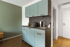 Suite | Cocina privada | Cafetera de espresso y tetera eléctrica