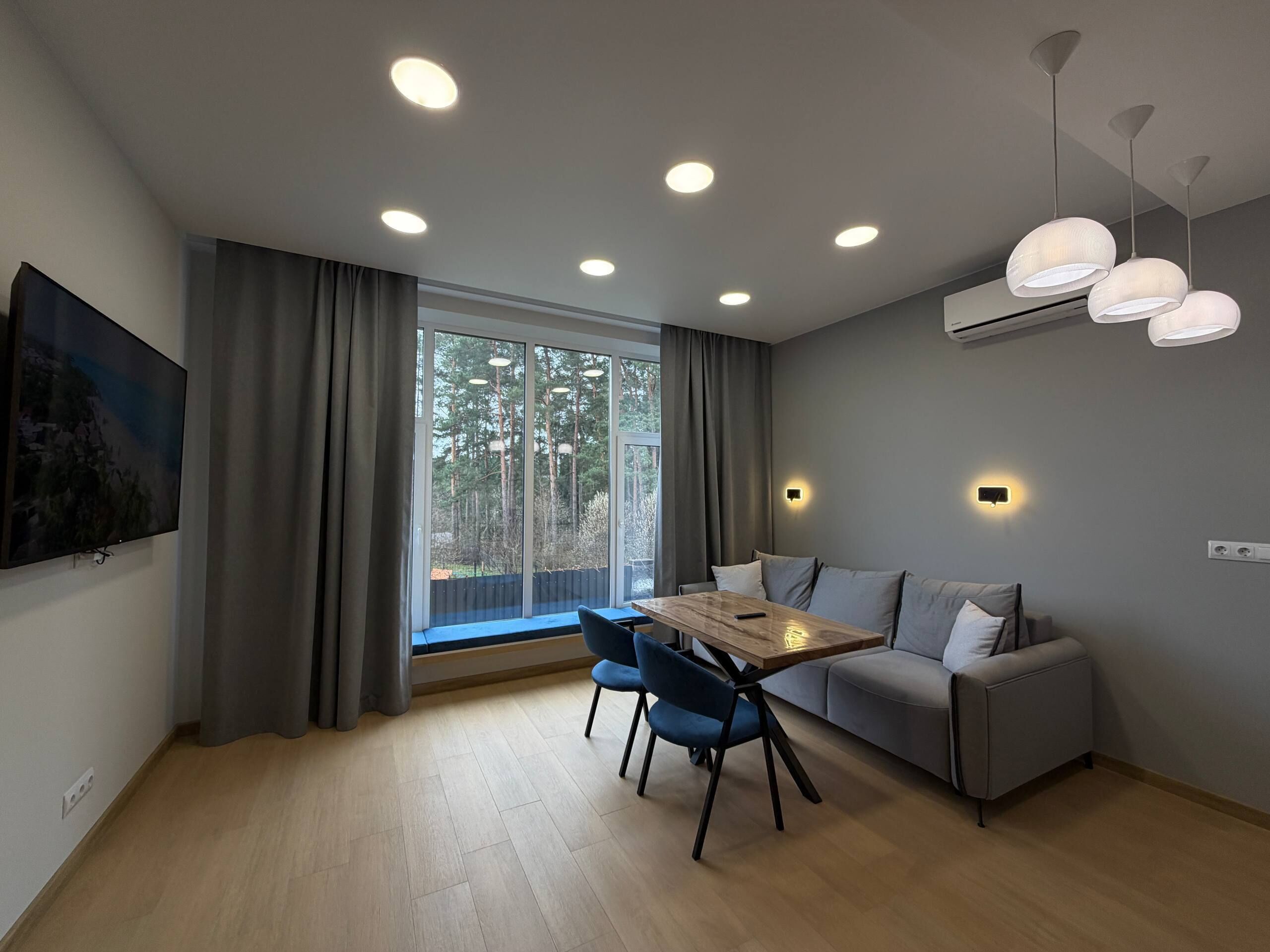 Classic Apartment, Courtyard View | Living area | 40-inch Smart TV with digital channels