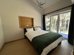 Comfort Apartment, Courtyard View | Desk, laptop workspace, blackout drapes, iron/ironing board