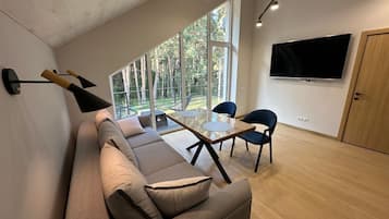 Comfort Apartment, Garden View | Living area