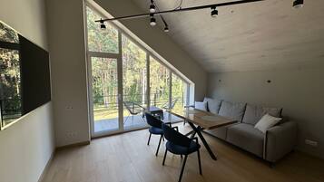 Comfort Apartment, Courtyard View | Living area | 40-inch flat-screen TV with digital channels