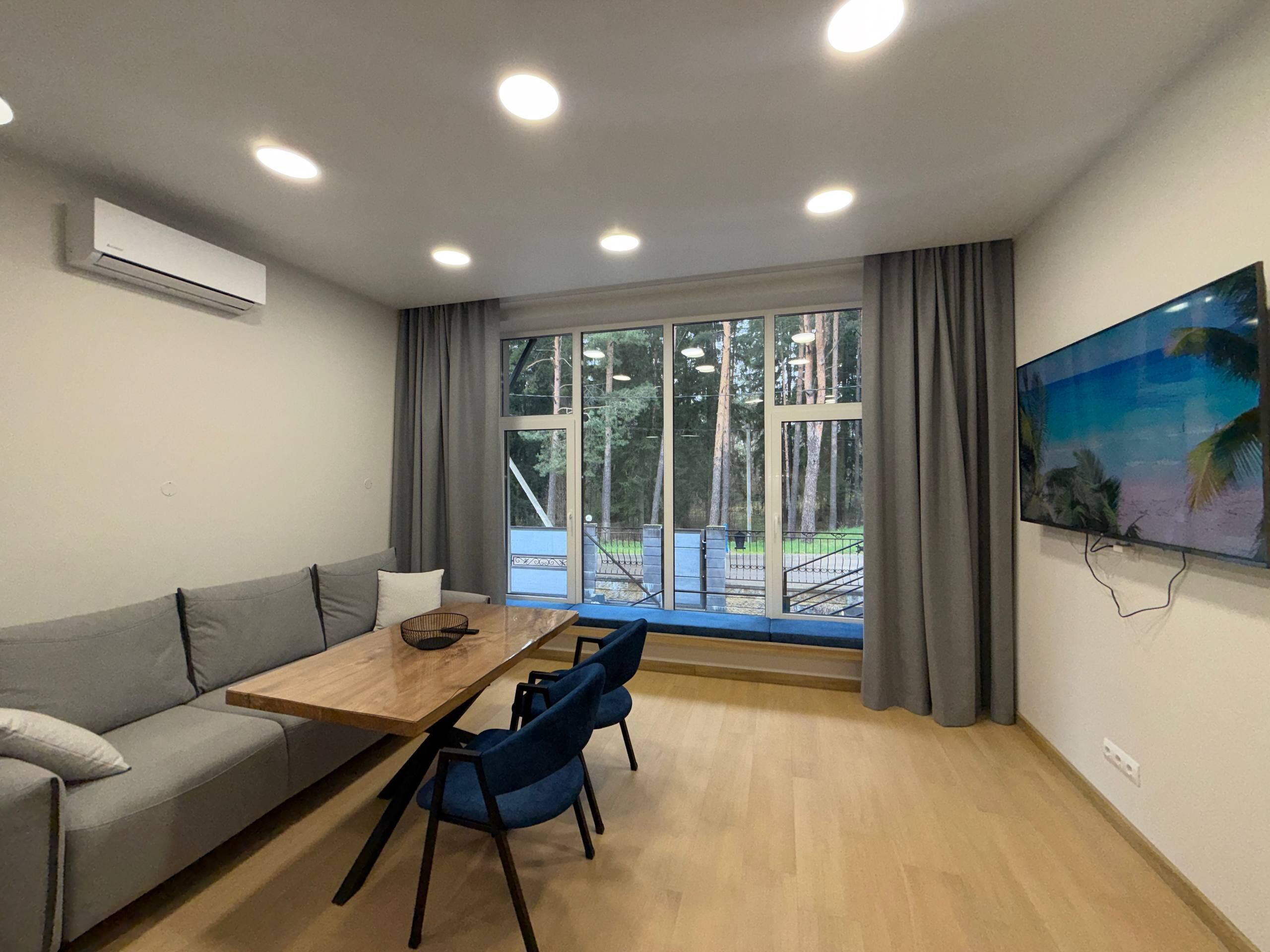 Classic Apartment, Garden View | Living area | 40-inch Smart TV with digital channels