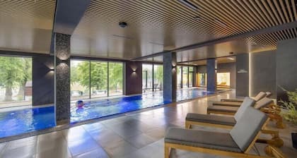 Holiday studio with balcony, indoor pool, sauna