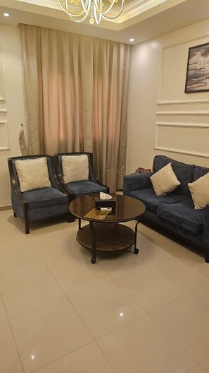 Suite Deluxe, 2 chambres | Salle de séjour