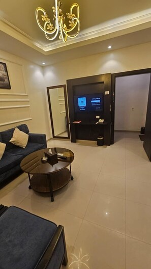 Deluxe Suite, 1 Bedroom | Ruang tamu