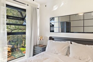 Iron/ironing board, travel crib, free WiFi, bed sheets