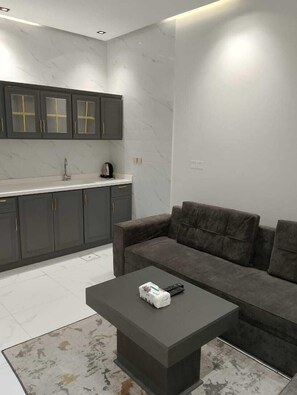 Suite Deluxe, 1 chambre | Coin séjour
