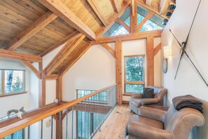 Smart TV, fireplace, foosball, books