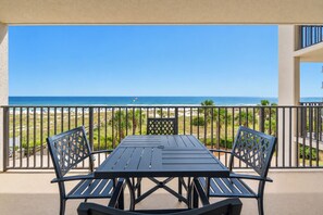 Outdoor dining - Phoenix East 203 – Gulf-front with pool views & resort amenities (Orange Beach)