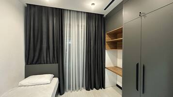 Blackout curtains, iron/ironing board, free WiFi