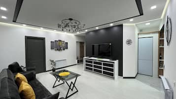 Appartement Deluxe, 2 chambres | Coin séjour