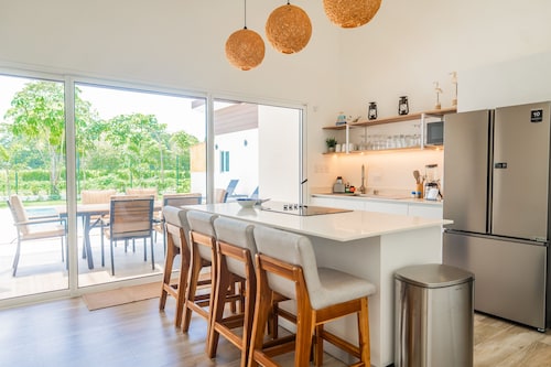 Peaceful home with patio, pool, grill, fast WiFi & 2-min walk to quiet beach