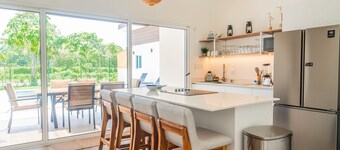 Peaceful home with patio, pool, grill, fast WiFi & 2-min walk to quiet beach