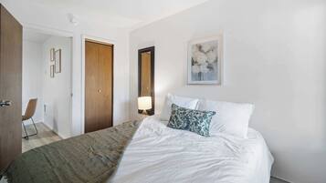 2 bedrooms, desk, iron/ironing board, travel crib