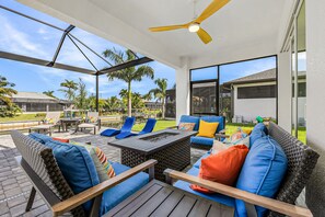 Terrace/patio - Sophisticated and serene home on waterway, sparkling pool, fireplace, W/D & AC (Cape Coral)