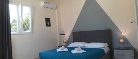 Basic Apartment | Egyptian cotton sheets, premium bedding, down duvets, pillow-top beds