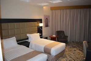 Deluxe Double or Twin Room | In-room safe, desk, laptop workspace, blackout drapes