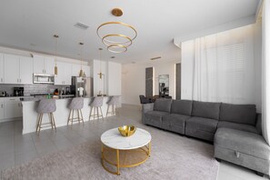 32-inch Smart TV with cable channels, Netflix, streaming services - Storey Lake Resort 4BR Home w/ Private Pool (Kissimmee)